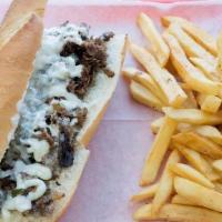 Philly Steak Sandwich · Thinly sliced steak, sautéed onion, green peppers, fresh mushrooms and melted swiss cheese.
