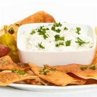 Taziki Dip · Cucumber, dill, and lemon. Served with soft or baked pita chips.