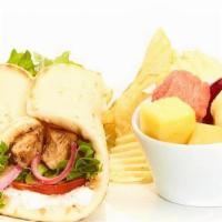 Grilled Chicken Gyro · Taziki sauce, tomatoes, mixed lettuce, and grilled onions. Served with chips and choice of a...