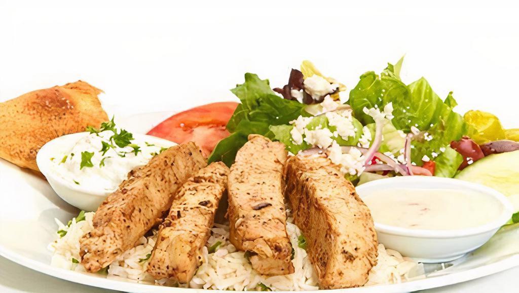 Grilled Chicken Breast Feast · Served with sauce. Served with Greek salad and your choice of roasted new potatoes or basmati rice.