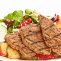 Chargrilled Lamb Feast · Served with skordalia sauce, Greek salad, and your choice of roasted new potatoes or basmati...