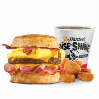 Monster Biscuit® Combo · Crispy bacon, sausage patty, thinly sliced ham, folded egg and two slices of American cheese...