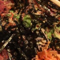 Hawaiian Poke Bowl (2 Proteins) · Topped with chopped cucumbers, green bell peppers, smelt roe, sesame seeds, julienne nori, a...