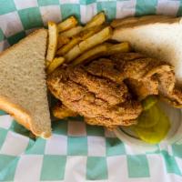 3 Piece Catfish Fillet Basket · 3 Pieces of fish, seasoned fries, 2 slices of bread, onions & pickles.