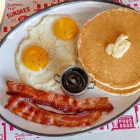 #2 Two Pancakes & Two Eggs Breakfast Meal · choice of bacon, ham, country or turkey sausage patties with home fries or cheese grits