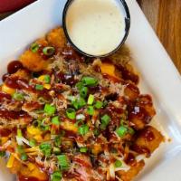 Bbq Loaded Cheese Tots · Fresh, hot tater tots loaded with melted cheddar and Monterey Jack cheeses, Brookwood Farms ...