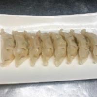 Pork Dumplings · 6 pieces. Steamed or pan-fried.
