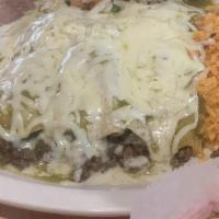 Enchiladas Verdes · 3 enchiladas stuffed with Shredded beef, chicken or pork carnitas, topped with fresh green t...