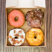 Assorted Vegan Doughnuts (4) · Chef's choice of 4 handmade vegan doughnuts (donuts).