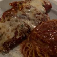 Eggplant Parmesan · Parmesan and mozzarella cheese melted over lightly breaded chicken breast topped with marina...