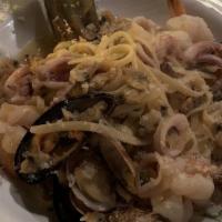 Seafood Combo · Shrimp, clams, mussels and calamari sauteed with olive oil, garlic, fresh basil, and marinar...