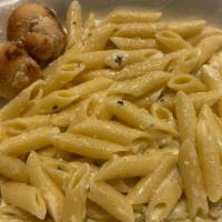 Penne Alfredo · Penne pasta served with homemade alfredo sauce.