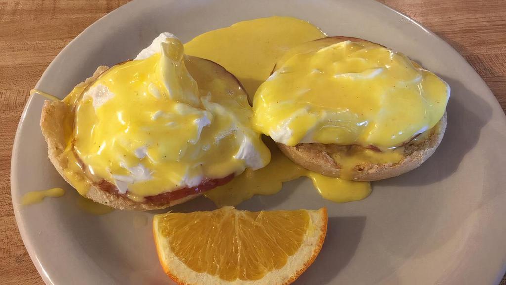 Eggs Benedict · Poached egg and Canadian bacon on an English muffin with hollandaise sauce.
