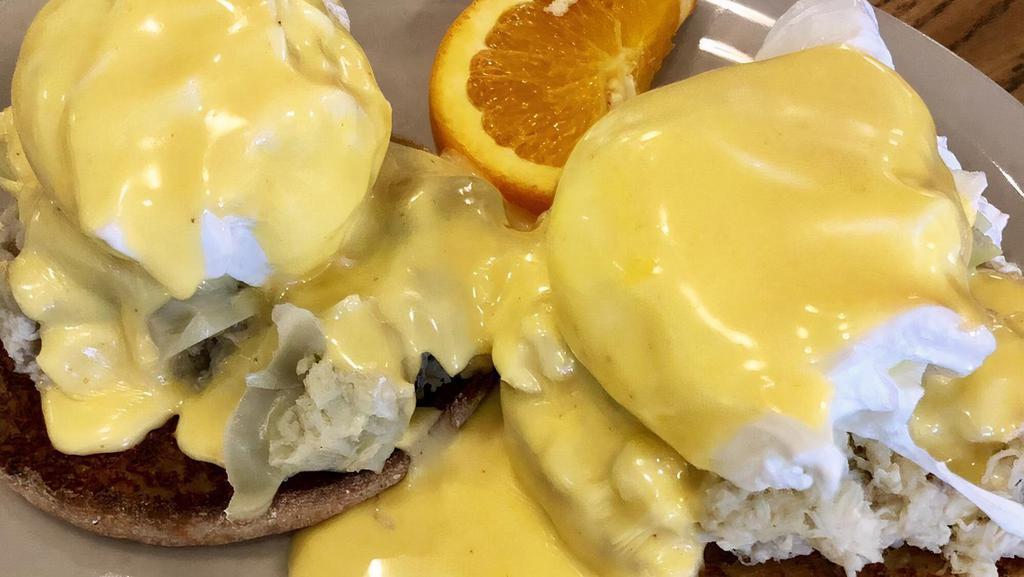 Eggs Temptations · Poached egg, real crab meat and artichoke hearts on an English muffin with hollandaise sauce.