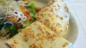 Quesadilla · Chicken, mushrooms, zucchini, onions, bell peppers, mozzarella and Cheddar cheese, served with salad and fruit bread.