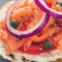 Lox-Smith (East Coast Classic) · Our House smoke salmon, whipped plain cream cheese with capers, red onions & vine ripe tomato
