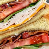 Turkey Blt Sandwich On Wheat  · A quarter pound of our house sliced turkey, on whole wheat bread, herb mayo with  Arcadia gr...