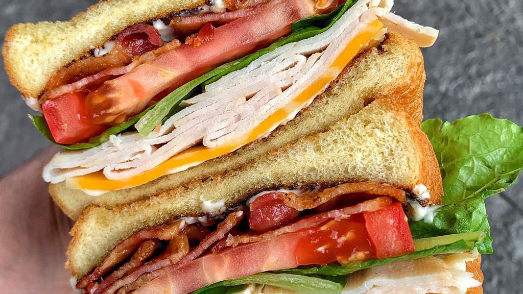 Turkey Blt Sandwich On Wheat  · A quarter pound of our house sliced turkey, on whole wheat bread, herb mayo with  Arcadia greens, vine ripe tomato and red onions plus our crispy bacon.