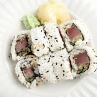 Spicy Tuna Roll · Gluten sensitive. Fresh sliced tuna, cucumber, spicy mayo.

This item is served using raw or...