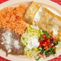 Chimichanga · A huge fried burrito stuffed with your choice of meat and fajita vegetables topped with crea...