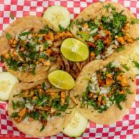 Tacos  · Delicious authentic tacos with the meat of your choice, topped with onions and cilantro, wit...