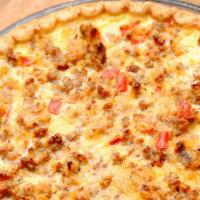 Roasted Red Pepper & Sausage Quiche · We use fresh ground sausage and red roasted peppers along with fresh grated Parmesan and 3 y...