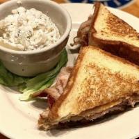 Turkey Melt · Sliced turkey breast on Texas toast, with melted American cheese and crisp bacon.
