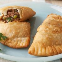 Ground Beef Empanada · Deep fried gluten free turnover made fresh by hand filled with: flavorful ground beef.