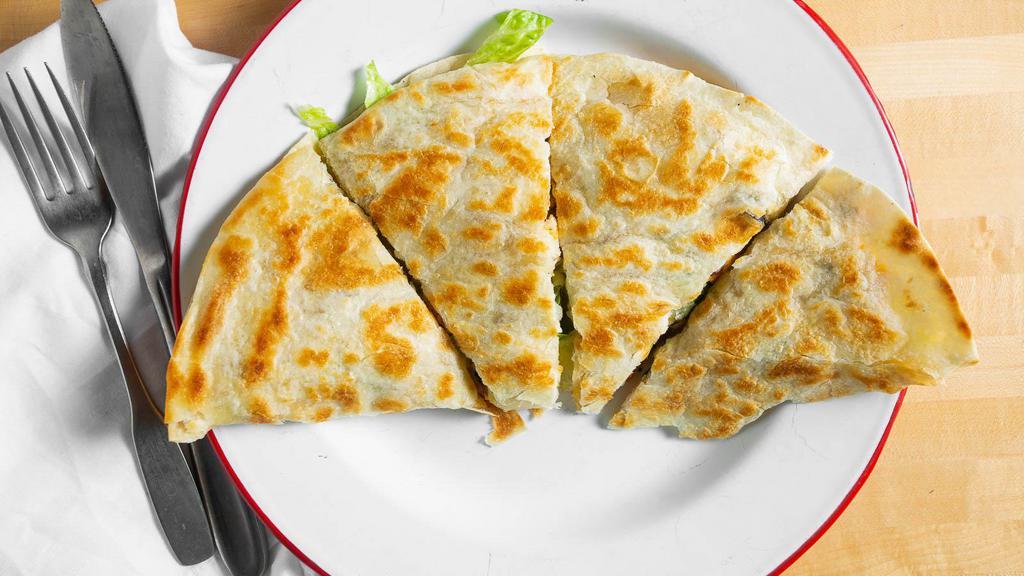 Chicken Quesadilla · Fresh, all-natural chicken breast, marinated in house dressing, chargrilled