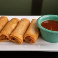 Crispy Spring Rolls Shrimp · 4 pieces. Crispy and light-filled with fresh cabbage, carrot and bean thread served with hom...