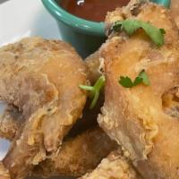  Fried Chicken Wing · Chicken wing breaded and fried to  golden brown. serve with sweet and sour sauce.