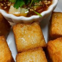 Fish Tofu 6 Pcs.  · Fried Fish Tofu to golden brown serves with sweet and sour sauce and fresh crunchy cucumber ...