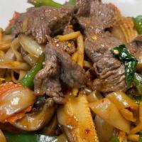 Drunken Noodles (Flat Noodle) · (choice of meat)Stir fried rice noodles with fresh chili, onion, bell pepper, mushrooms, bab...