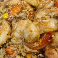 Combination Pineapple Fried Rice. · Combination meat Chicken, Beef, Pork,and Shrimps fried rice mixed with corn,raisins,carrot,g...