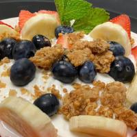Yogurt Parfait · Greek yogurt topped with granola and choice of  strawberry or mixed berries.