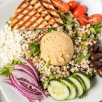 Mediterranean Plate · Classic hummus served with quinoa, couscous, mixed greens, cucumbers, grape tomatoes, red on...