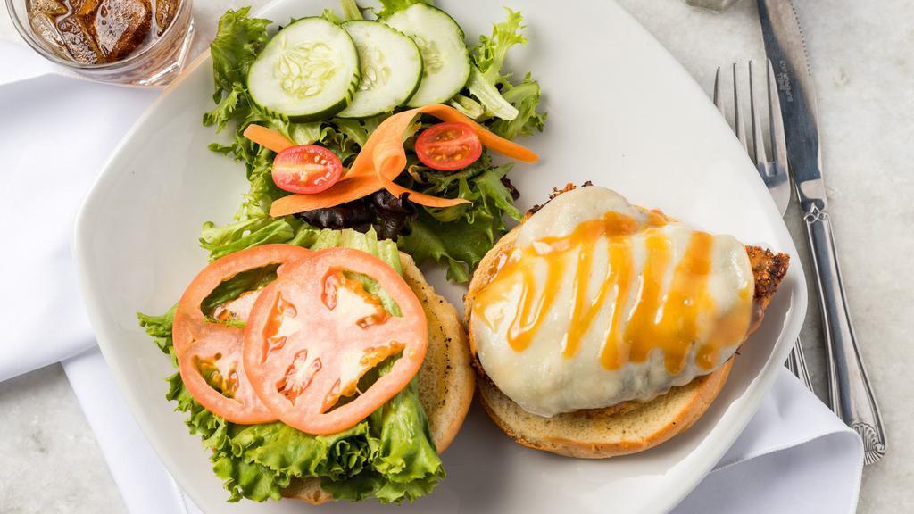 Blackened Chicken Sandwich · Served on a brioche bun with provolone, tomatoes, lettuce and spicy honey mustard.