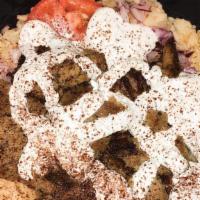 Gyro Bowl · With small drink.  Lamb & beef over a bed of rice with homemade tzatziki sauce,  tomatoes & ...