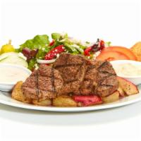 Grilled Beef Tender Feast · Served with a side of horseradish sauce, Greek salad, and your choice of roasted new potatoe...