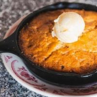 Skillet Cornbread · Cast iron cornbread served with whipped butter and honey