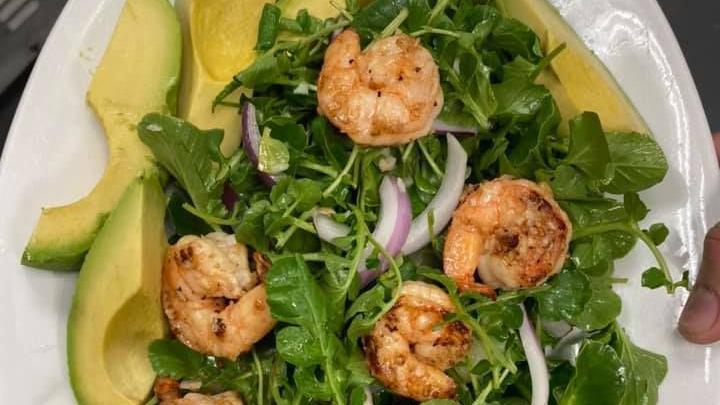 Ensalada De Aguacate · Gluten free. Watercress, avocado, pineapple, red onions, garlic, black pepper and a homemade dressing. Add shrimp for an additional charge.