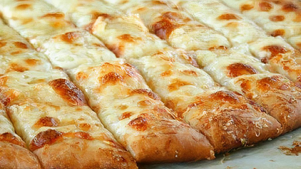 Cheese Bread · Cheesy bread sticks are covered with butter, garlic & herbs, and mozzarella cheese. Served with 2 side of marinara sauce.