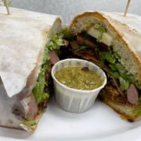 Torta Cubana · Sandwich with 3 meats, Lettuce,Cheese, Tomato,Avocado, And Pickled Jalapeño