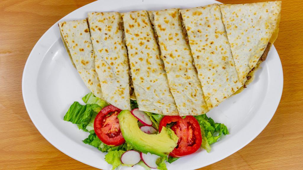 Quesadillas · Flour tortilla, meat, cheese, Small Salad On The Side