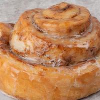 Cinnamon Biscuit Roll · Made in house with our Famous Biscuit Dough topped  with a sweet glaze.
