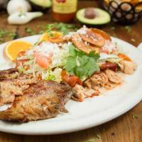 Enchiladas Jaliscienses · Three semi fried tortillas on red salsa filled with chicken, beef or cheese, lettuce, tomato...