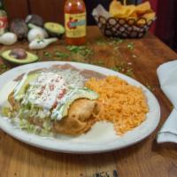 Chimichanga Plate · Most popular. Rolled and fried tortilla filled with rice and beans and your choice of chicke...