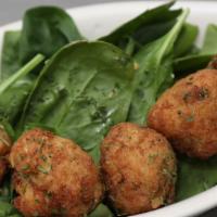 Crab Balls · Our Signature Crab cake mix, served in a meatball form, fried to a crispy golden brown, serv...