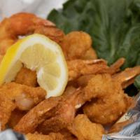 Southern Shrimp Cocktail · Our jumbo shrimp, lightly breaded and southern fried, served in a Martini glass over a bed o...