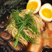 Tonkotsu Pork Ramen  · Pork Ramen w/ Pork belly, marinated egg, vegetables, seaweed, mushroom